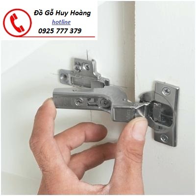 sửa bản lề tủ quận 2